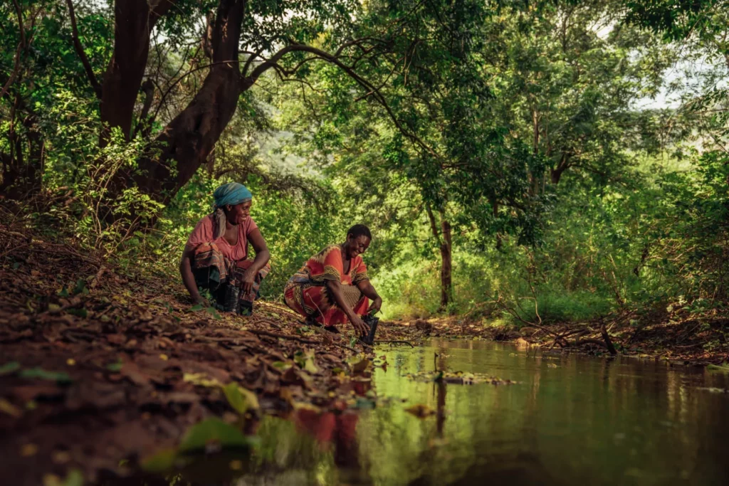 Kasigau women by the creek